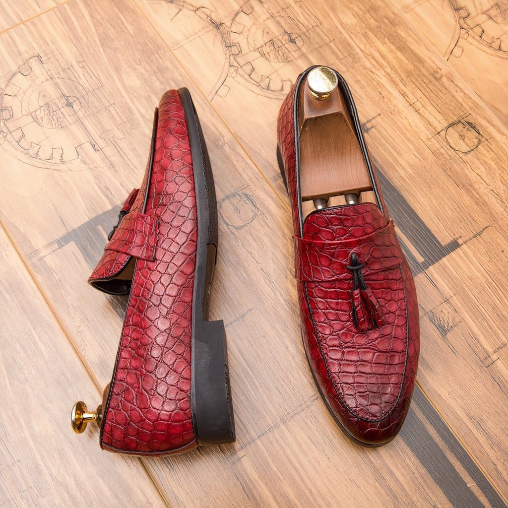 Tassel loafers in faux snake-effect leather
