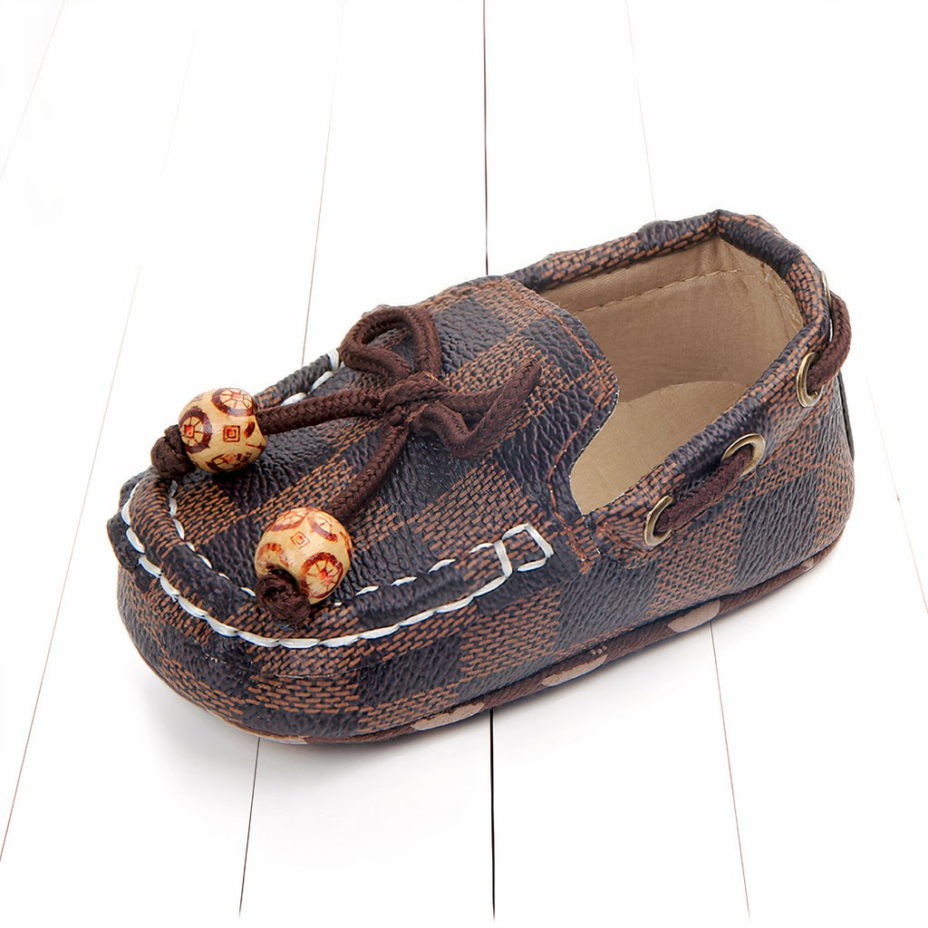 Trendy checkered baby moccasins with decorative beads