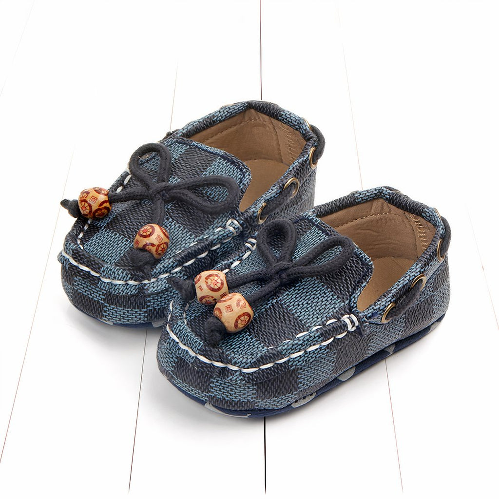 Trendy checkered baby moccasins with decorative beads