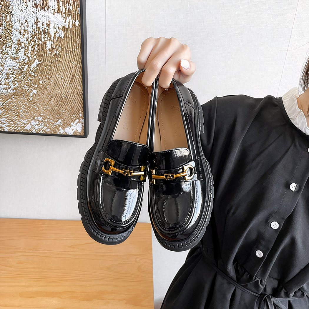 Women's black patent loafers