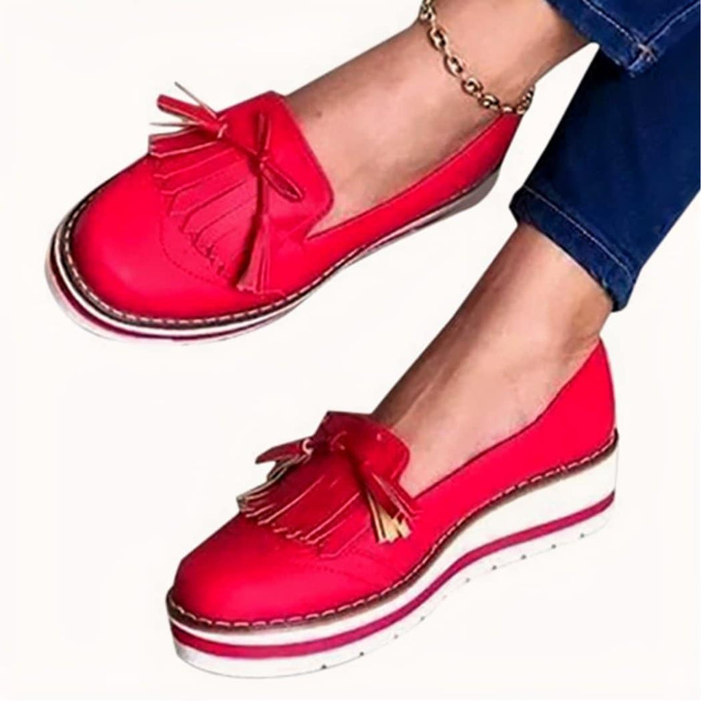 Women's fringed wedge heel loafers