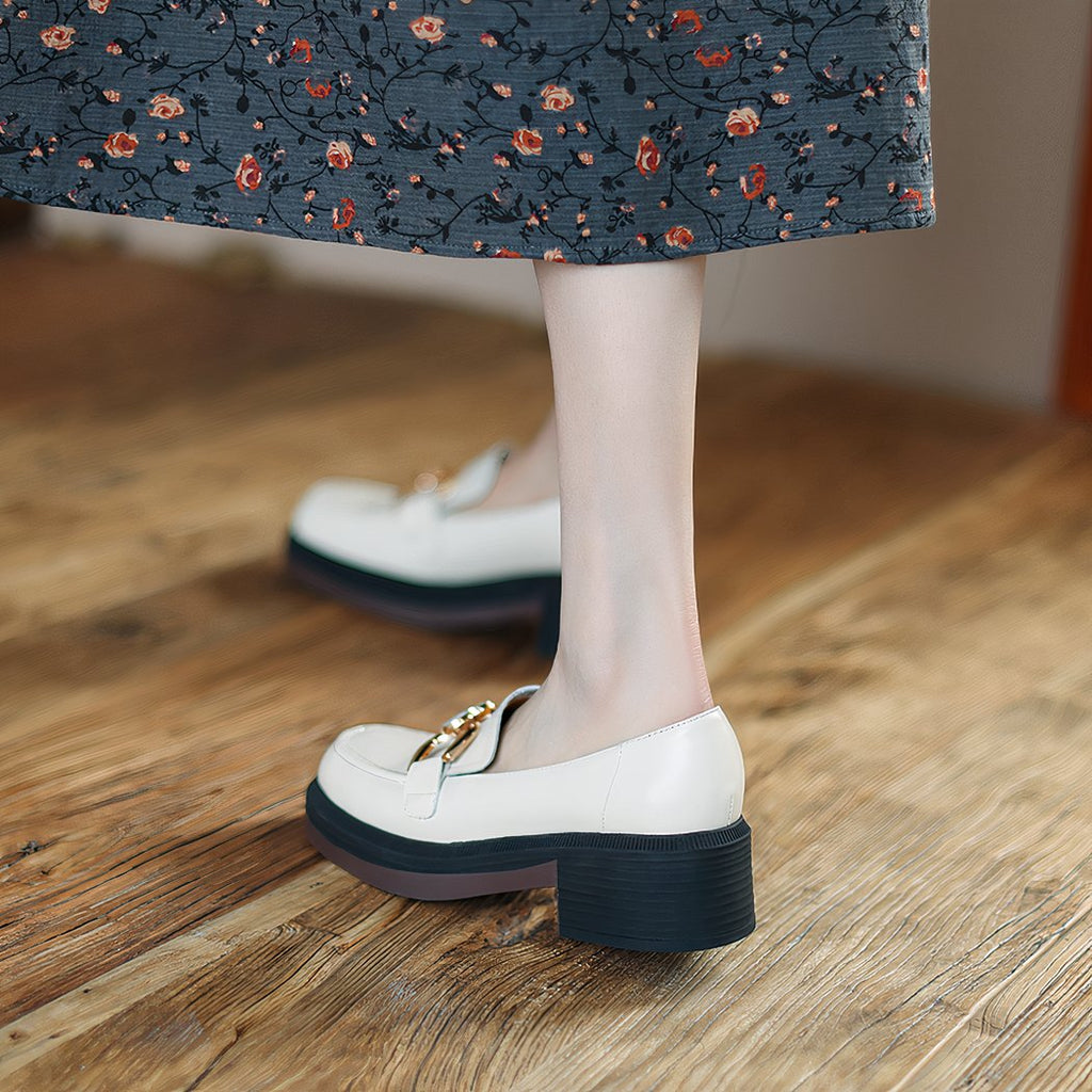 Women's leather loafers with heel and thick sole