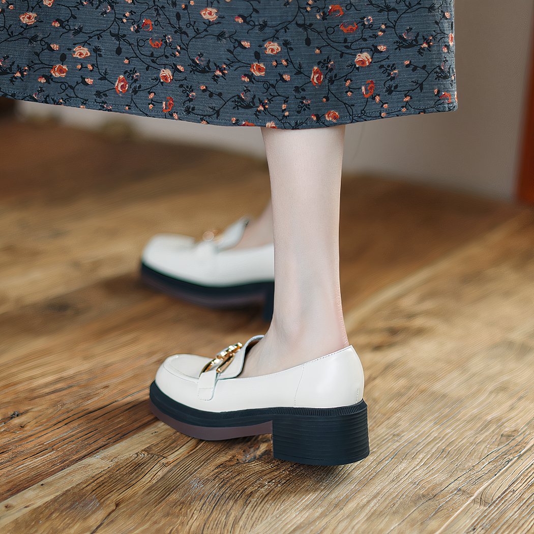 Women's leather loafers with heel and thick sole