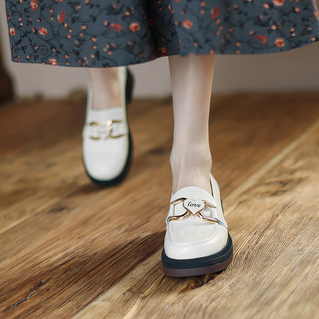 Women's leather loafers with heel and thick sole