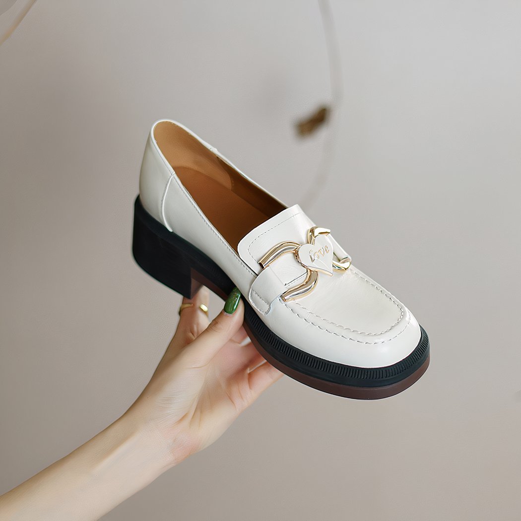 Women's leather loafers with heel and thick sole