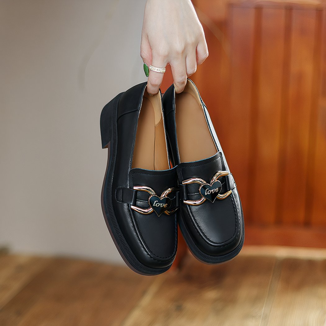 Women's leather loafers with heel and thick sole