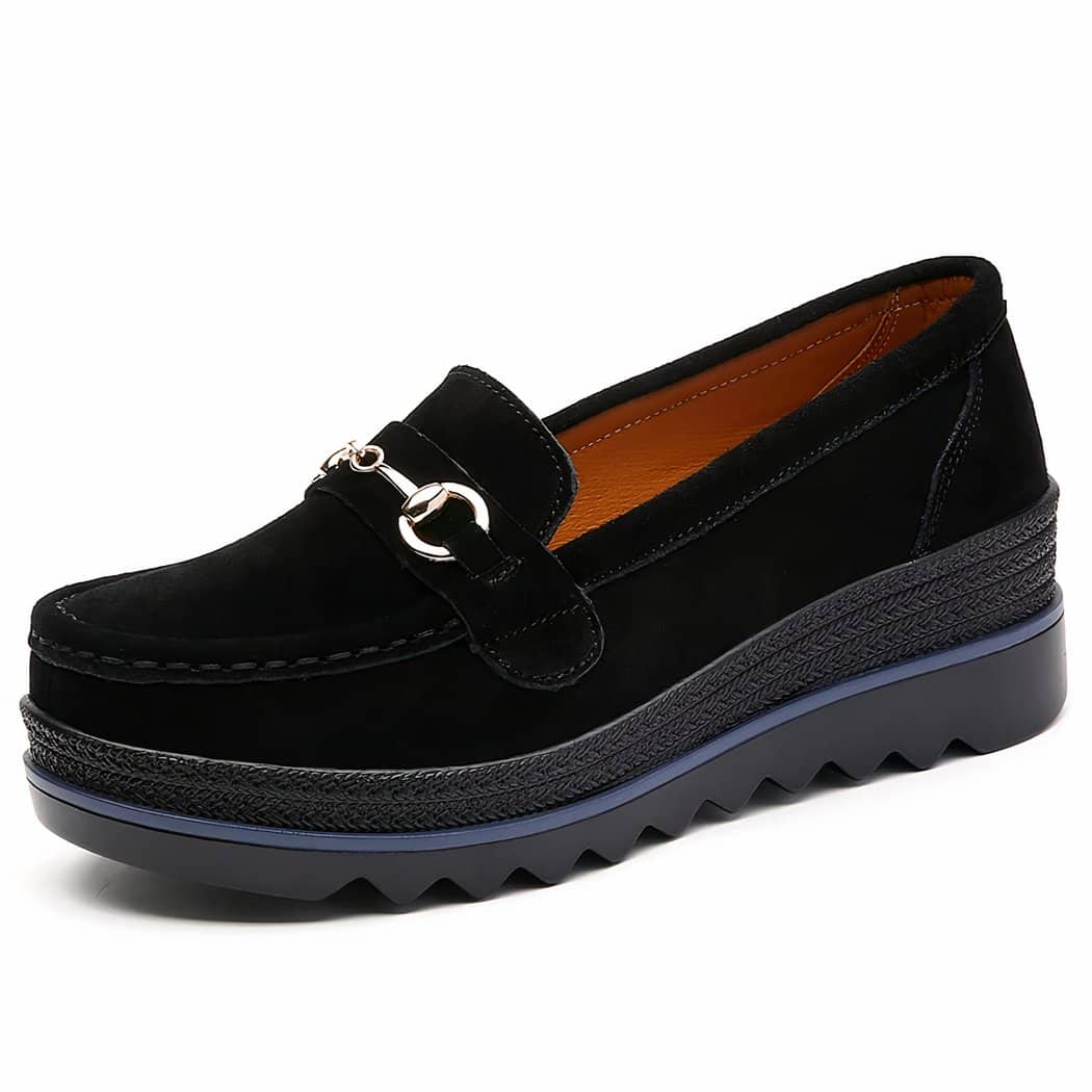 Women's loafers with wedge soles and decorative metal elements