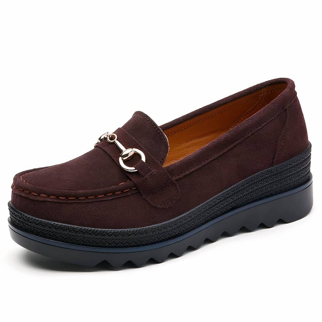 Women's loafers with wedge soles and decorative metal elements