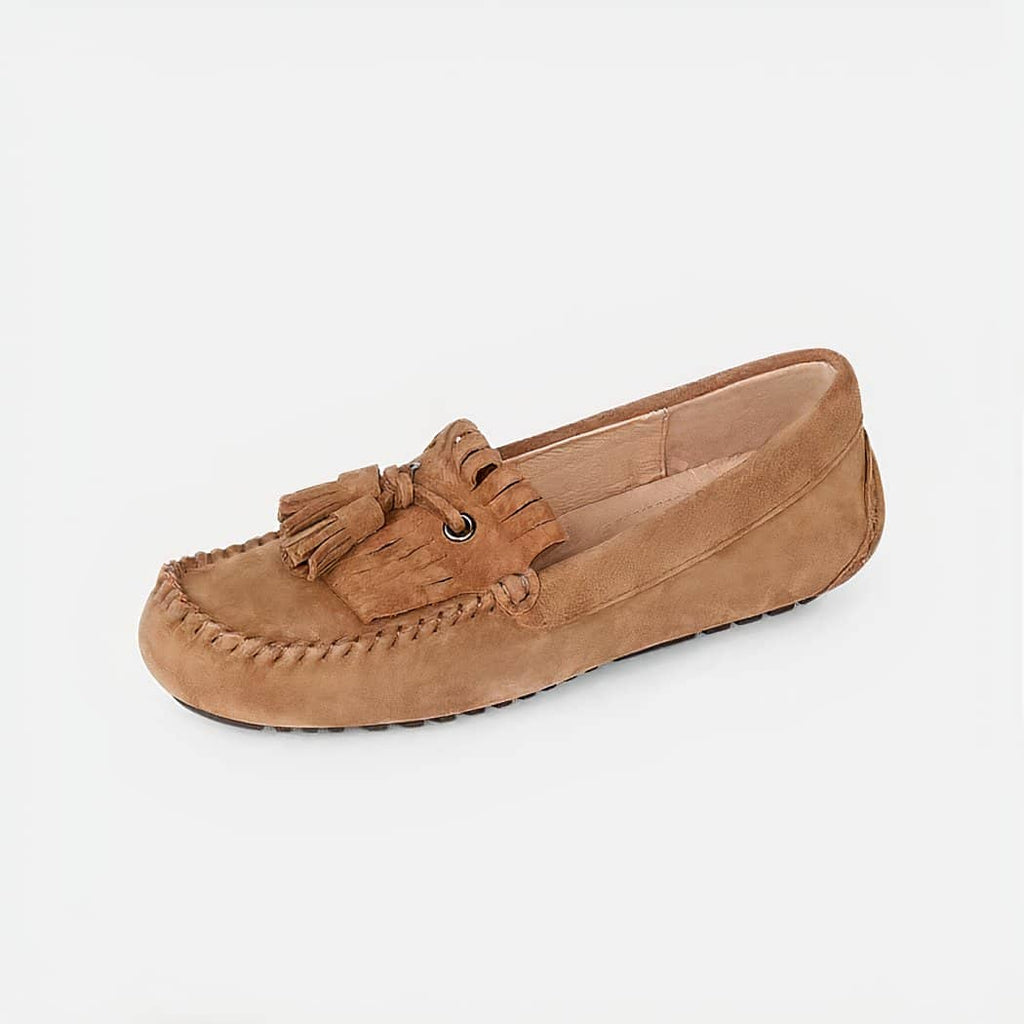 brown suede loafer with tassel on a white background