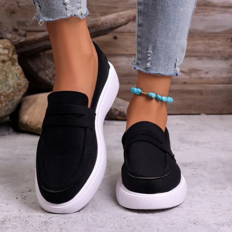 Women's chunky white sole strap loafer in Black