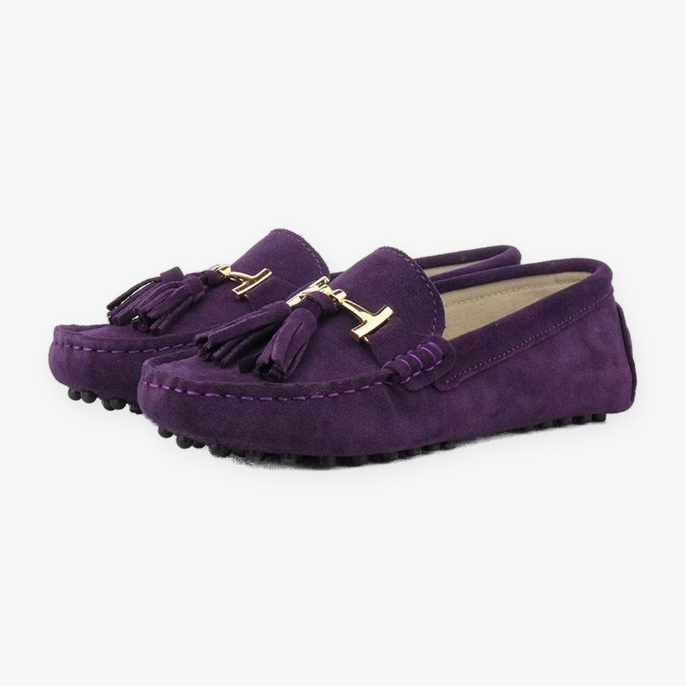 Women's leather tassel loafer with gold bit, fuchsia profile view