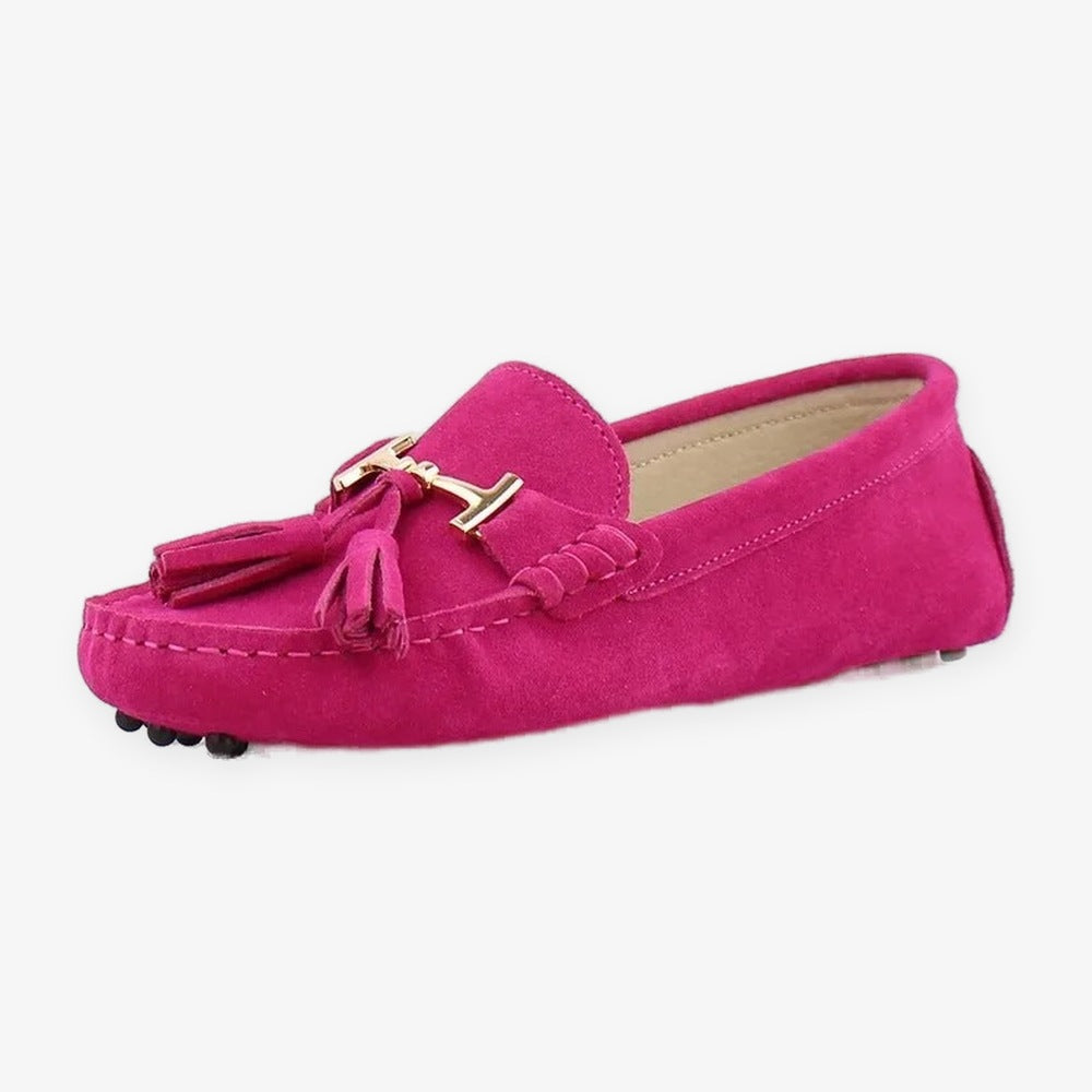 Women's leather tassel loafer with gold bit, turquoise close-up of the sole