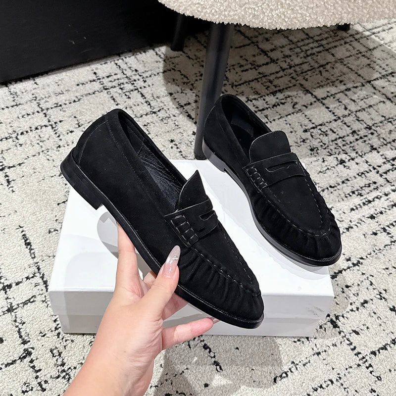 Women's faux suede penny loafer mule in Black