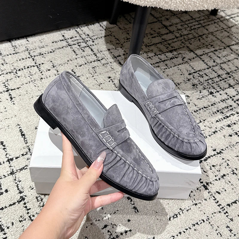 Women's faux suede penny loafer mule in Gray