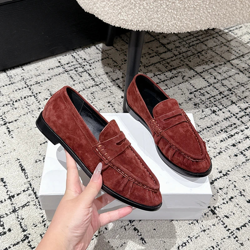Women's faux suede penny loafer mule in Black