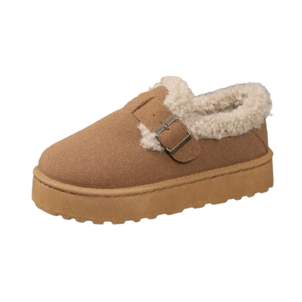 Decorative buckle on the fur-lined moccasin