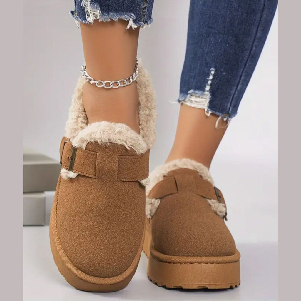 White faux fur interior of the moccasin