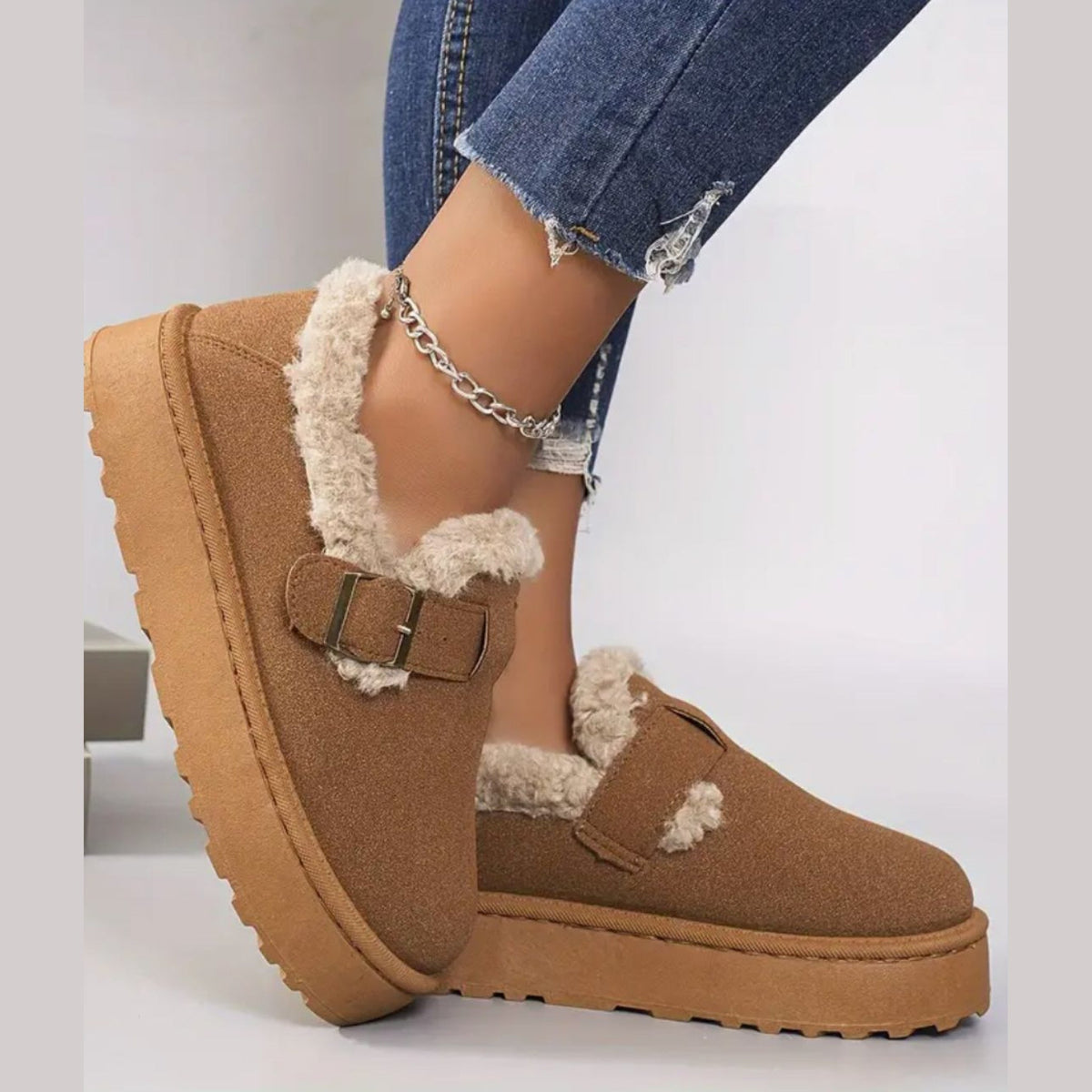 Fur-lined moccasins, back view