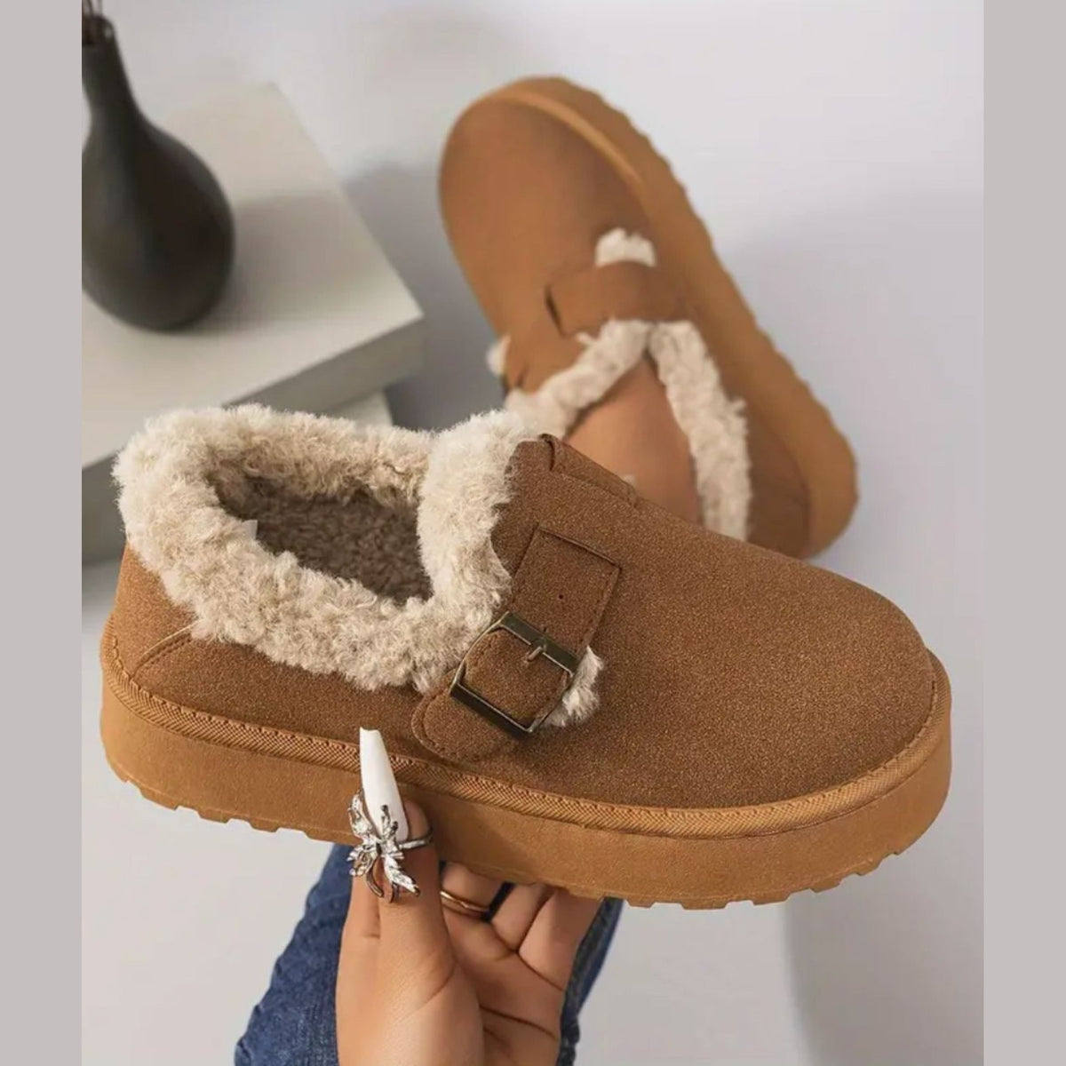 Fur-lined moccasins, front view