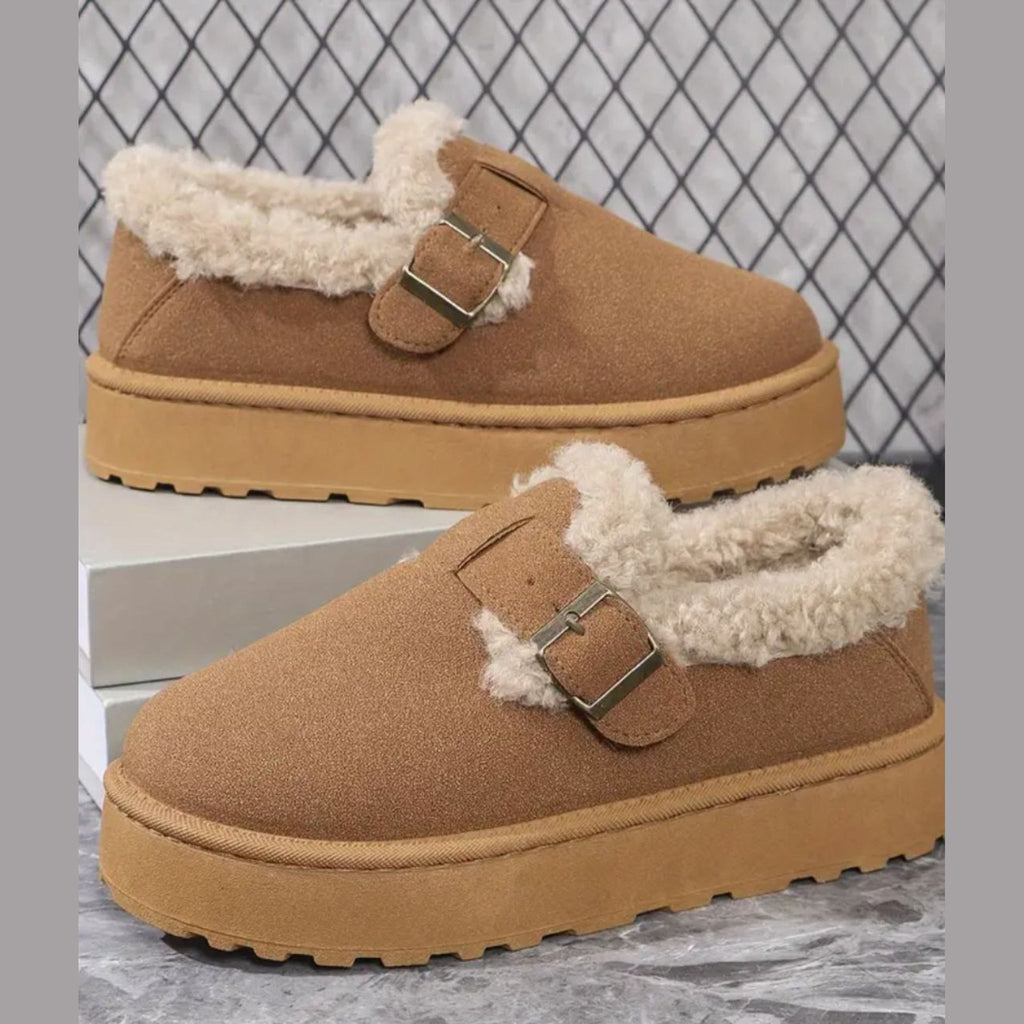 Fur-lined moccasins worn outdoors