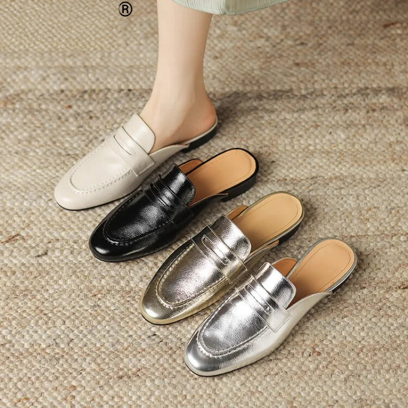 Women's leather penny loafer mule with low heel in beige