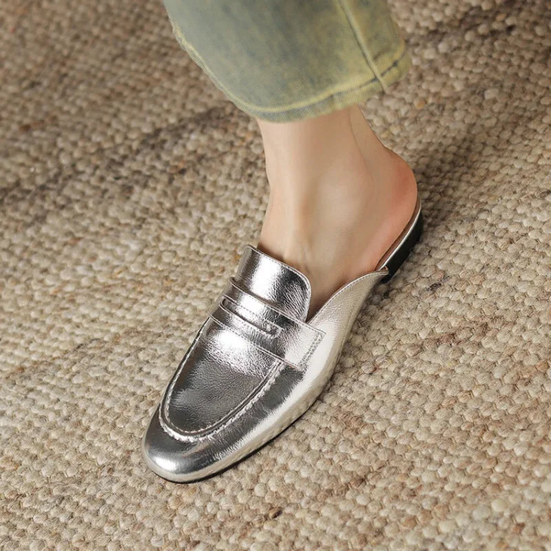 Women's leather penny loafer mule with low heel in silver