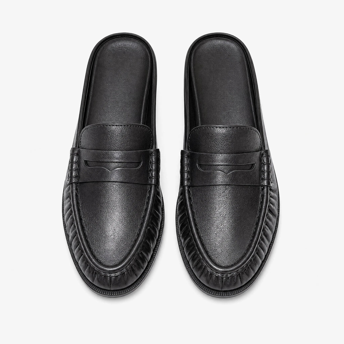 Women's leather penny loafer mule with flat heel in Smooth black