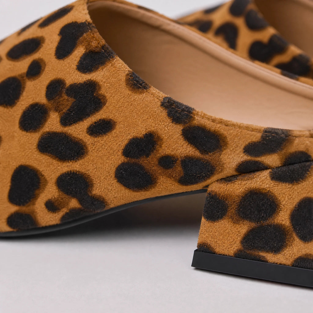Women's leopard-print loafer mules with block heel, side view
