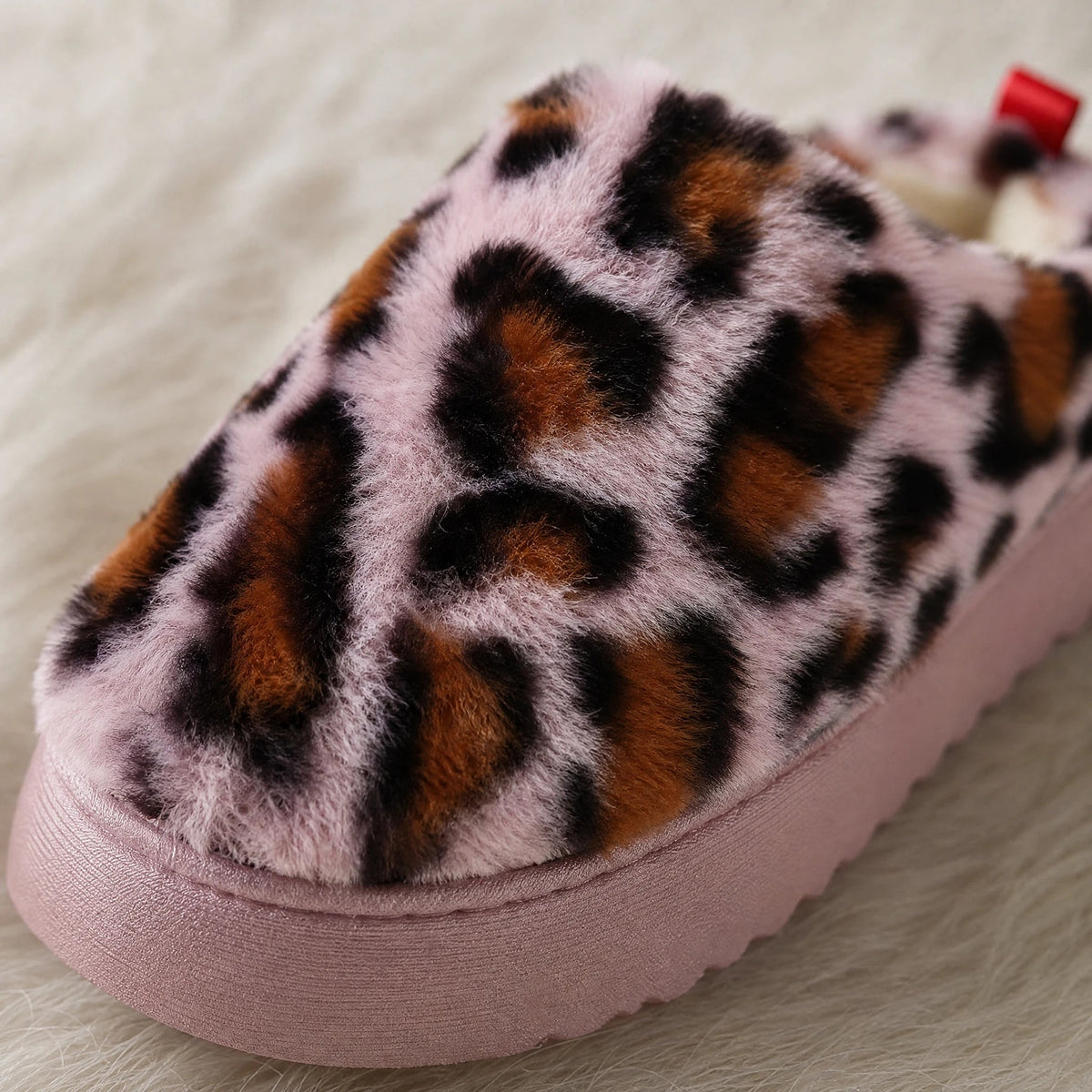 Leopard print mule with red pull tab