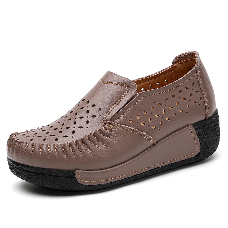Perforated leather loafer with thick platform sole