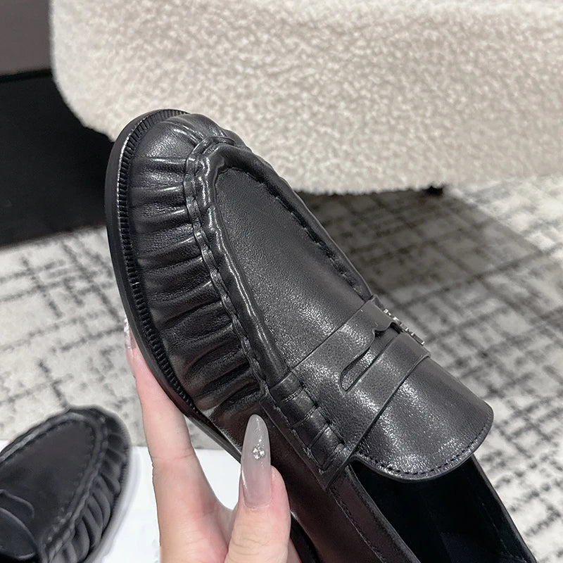 Women's smooth leather-look penny loafer with open heel in Chocolate