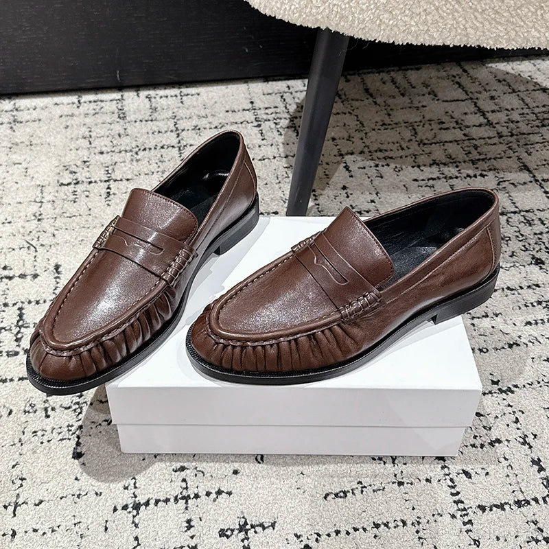 Women's smooth leather-look penny loafer with open heel in Silver
