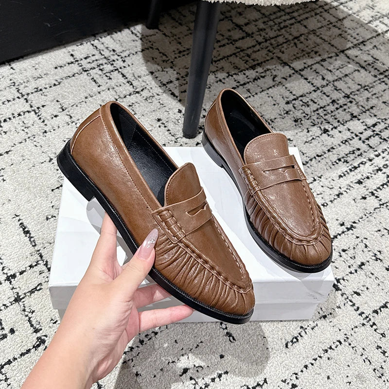 Women's smooth leather-look penny loafer with open heel in Silver