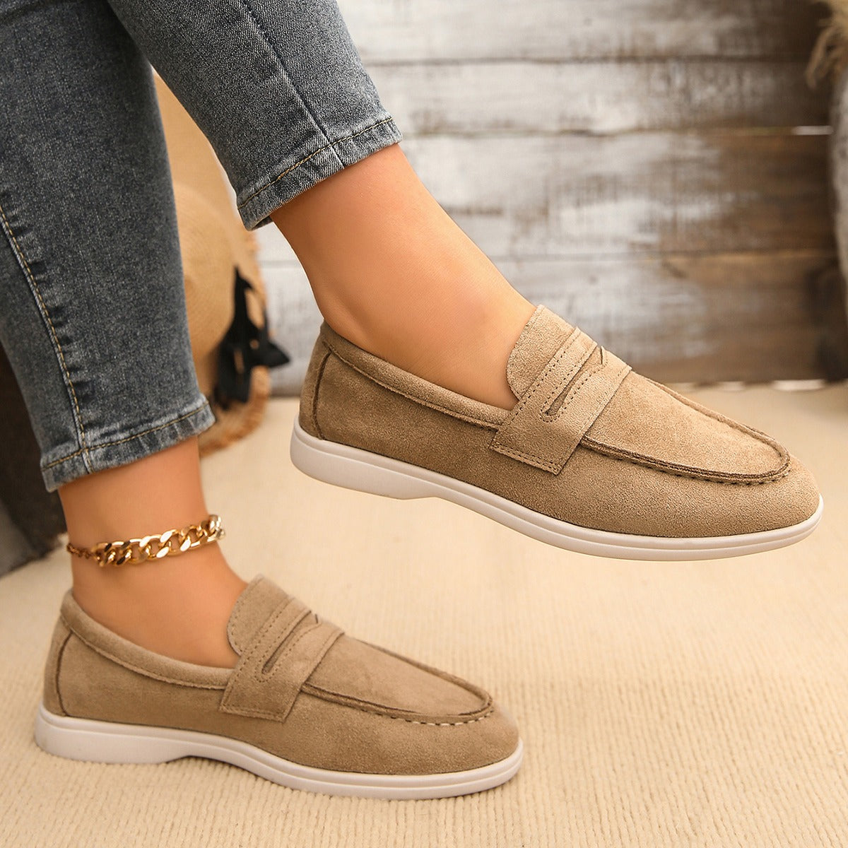 Women's strap loafer with white sole, navy lifestyle shot