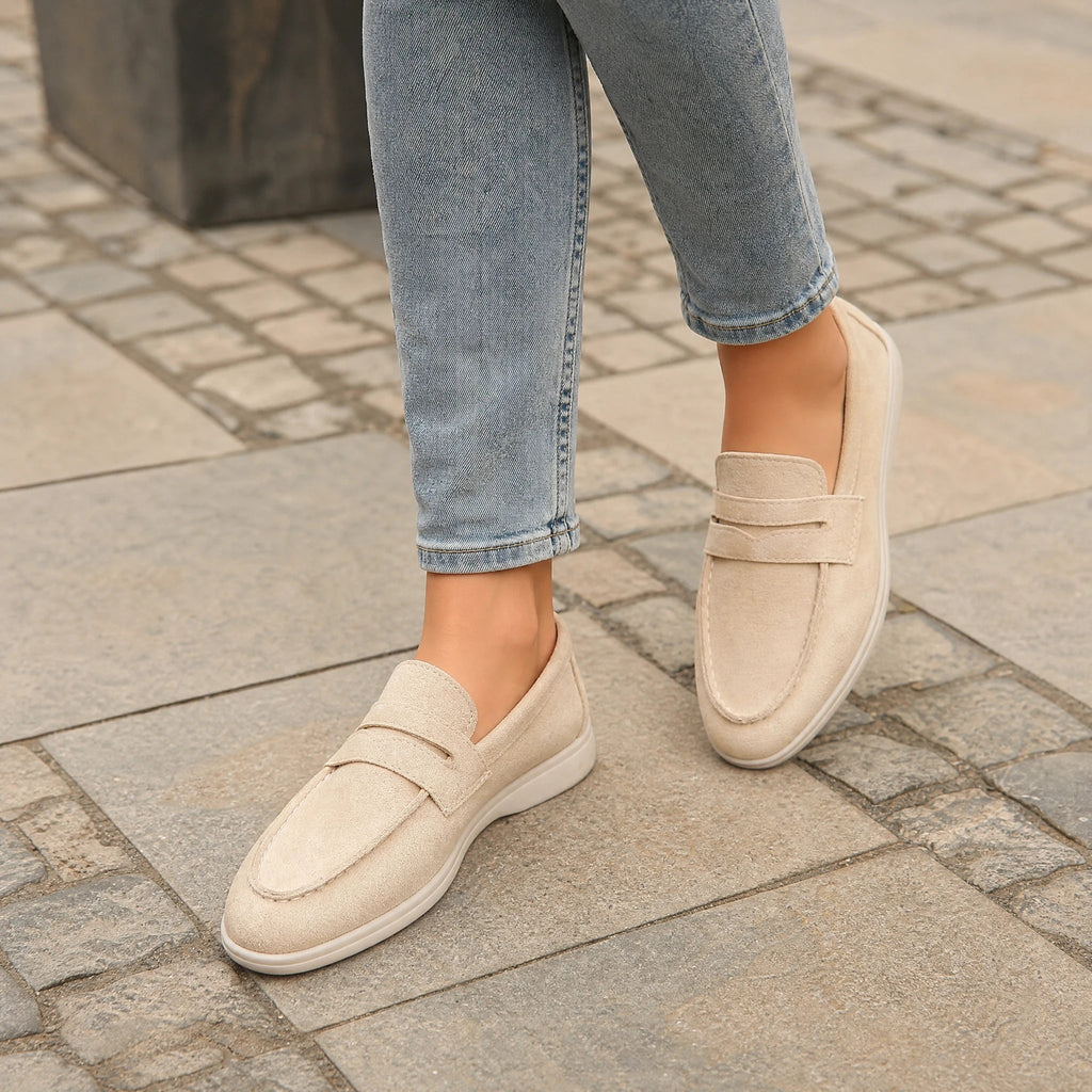 Women's strap loafer with white sole, navy top view