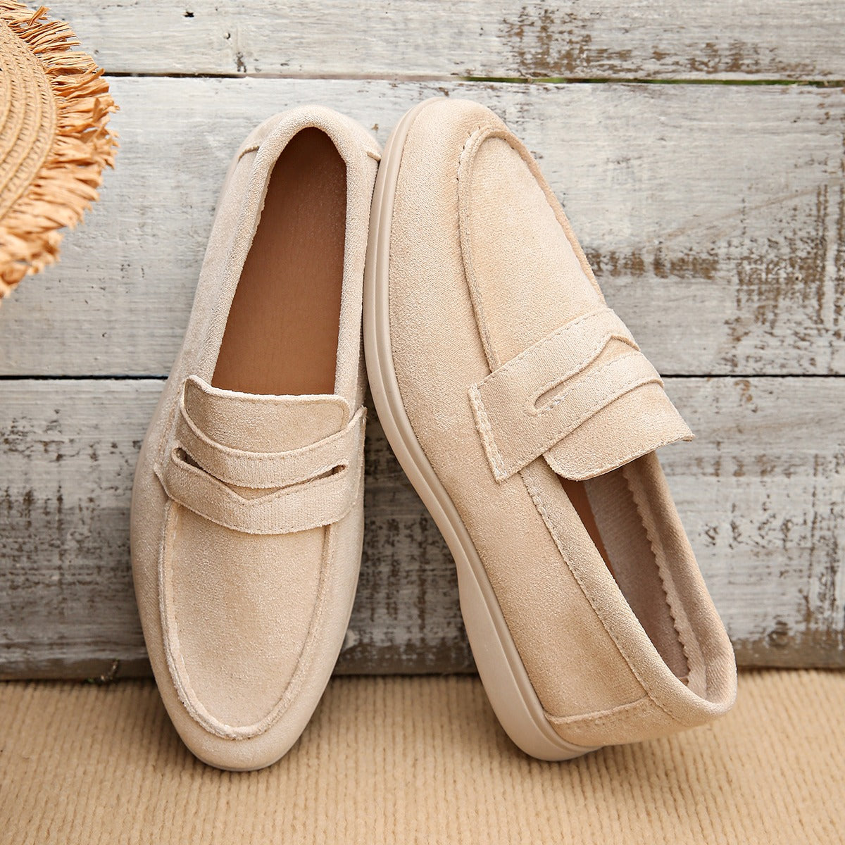 Women's strap loafer with white sole, beige close-up of the sole