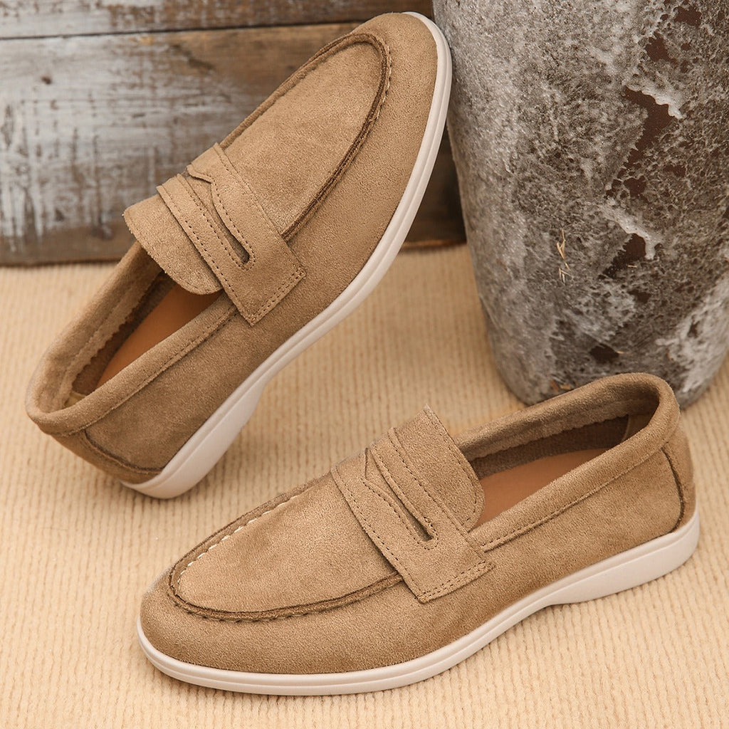 Women's strap loafer with white sole, camel worn on foot
