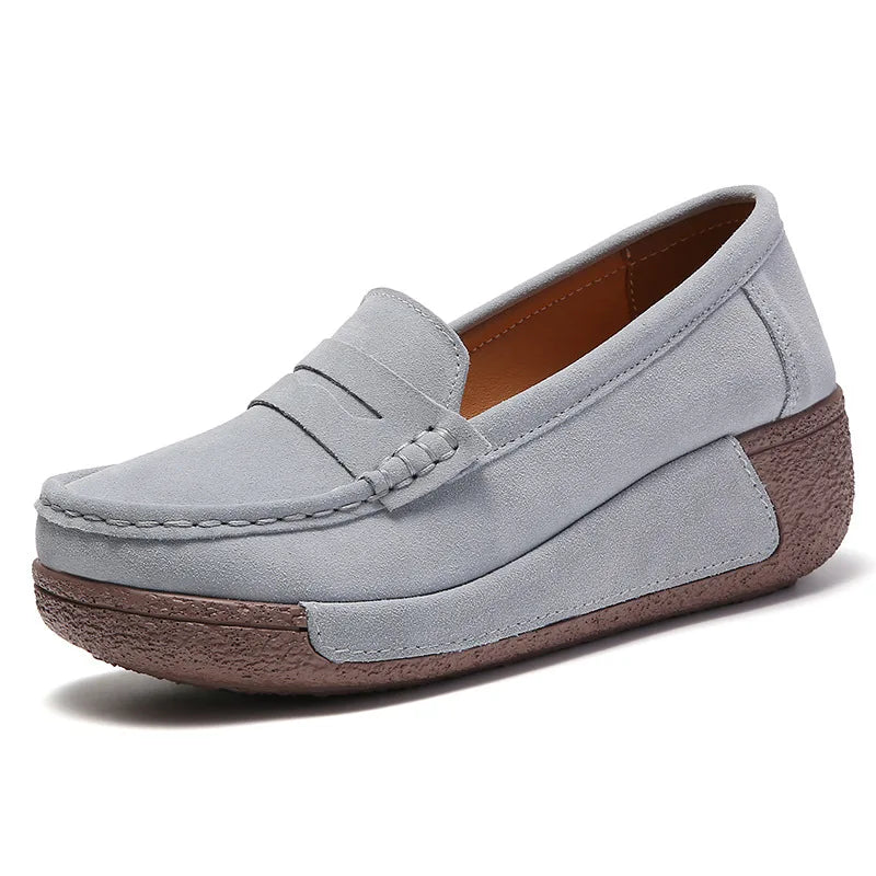 Women's suede wedge loafers with penny finish in Dark Gray, back view