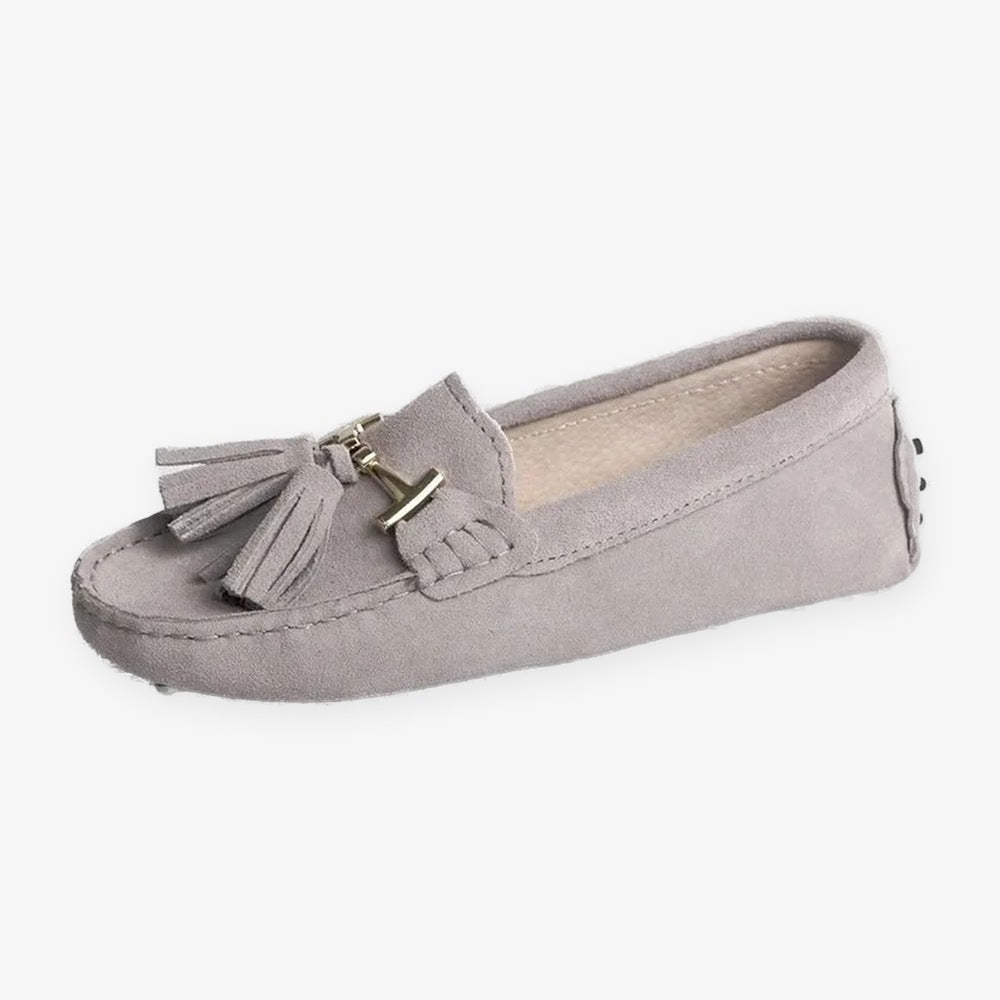 Women's leather tassel loafer with gold bit, camel lifestyle shot