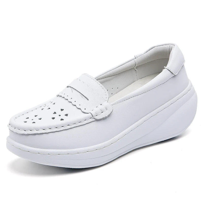 White platform loafer with blue heel