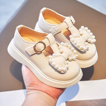 white PU baby moccasin with bow on top and pearls