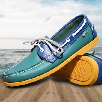 Blue and green boat moccasin on brown and blue background.