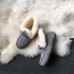 Winter Indian moccasin in grey suede on fur rug