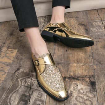 Feet of a person wearing gold sequined moccasins on a brown parquet floor