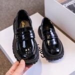 Shiny black spring moccasins for boys