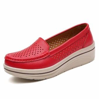 Red leather moccasin on white background