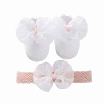 white cotton baby moccasin with pretty bow on top and matching headband