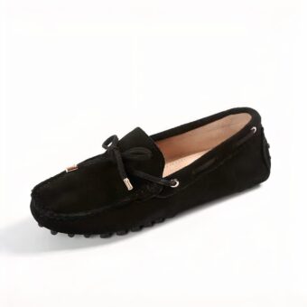 Photo of a black moccasin on a white background