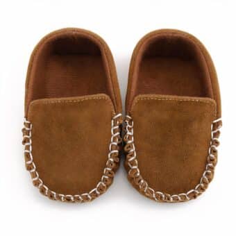 brown faux suede baby moccasin with white piping