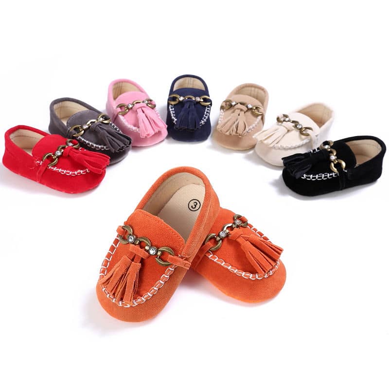 baby moccasin in orange, red